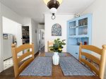 The dining table has seating for 4 people